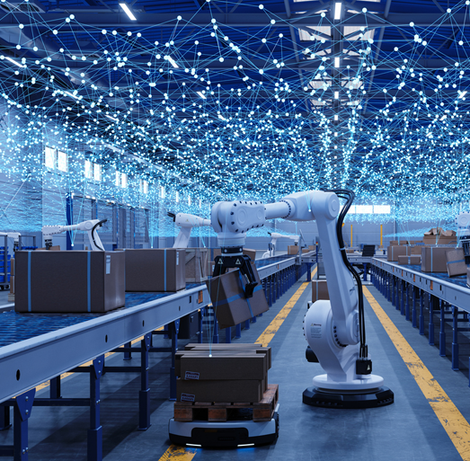 Robotic arms handling packages on an automated manufacturing conveyor line in a connected smart warehouse