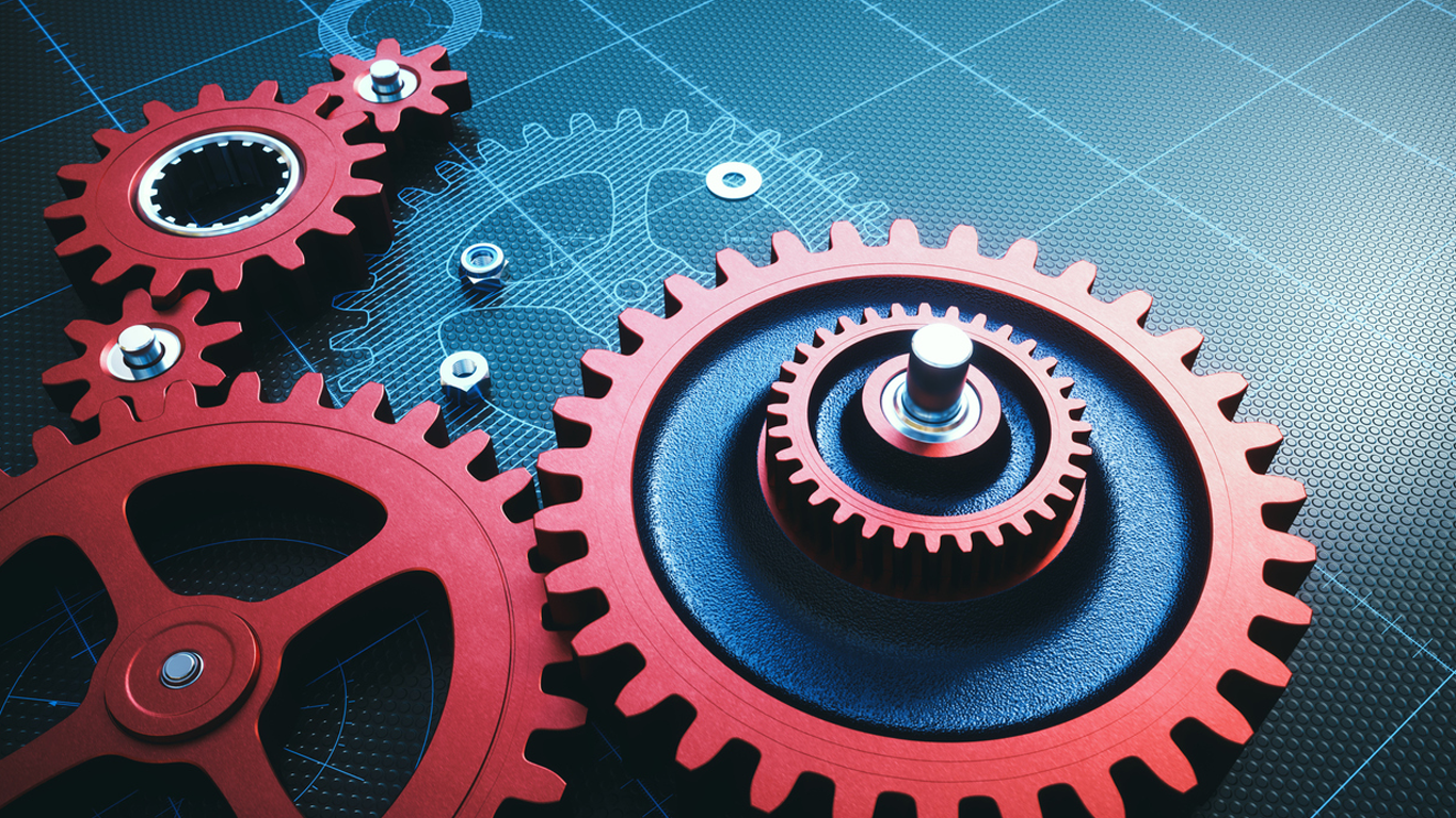 red industrial gears and mechanical components on a blue technical blueprint background